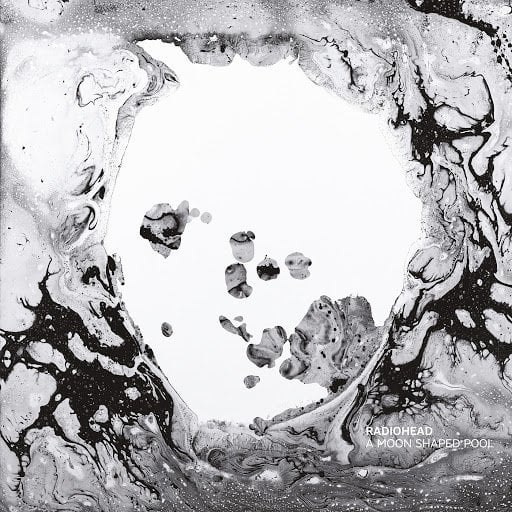 《Radiohead-2016年专辑-AMoonShapedPool》Radiohead以细腻的弦乐和空灵电子音景编织梦境，歌词深邃如诗，仿佛坠入月光笼罩的忧郁池水，既脆弱又震撼